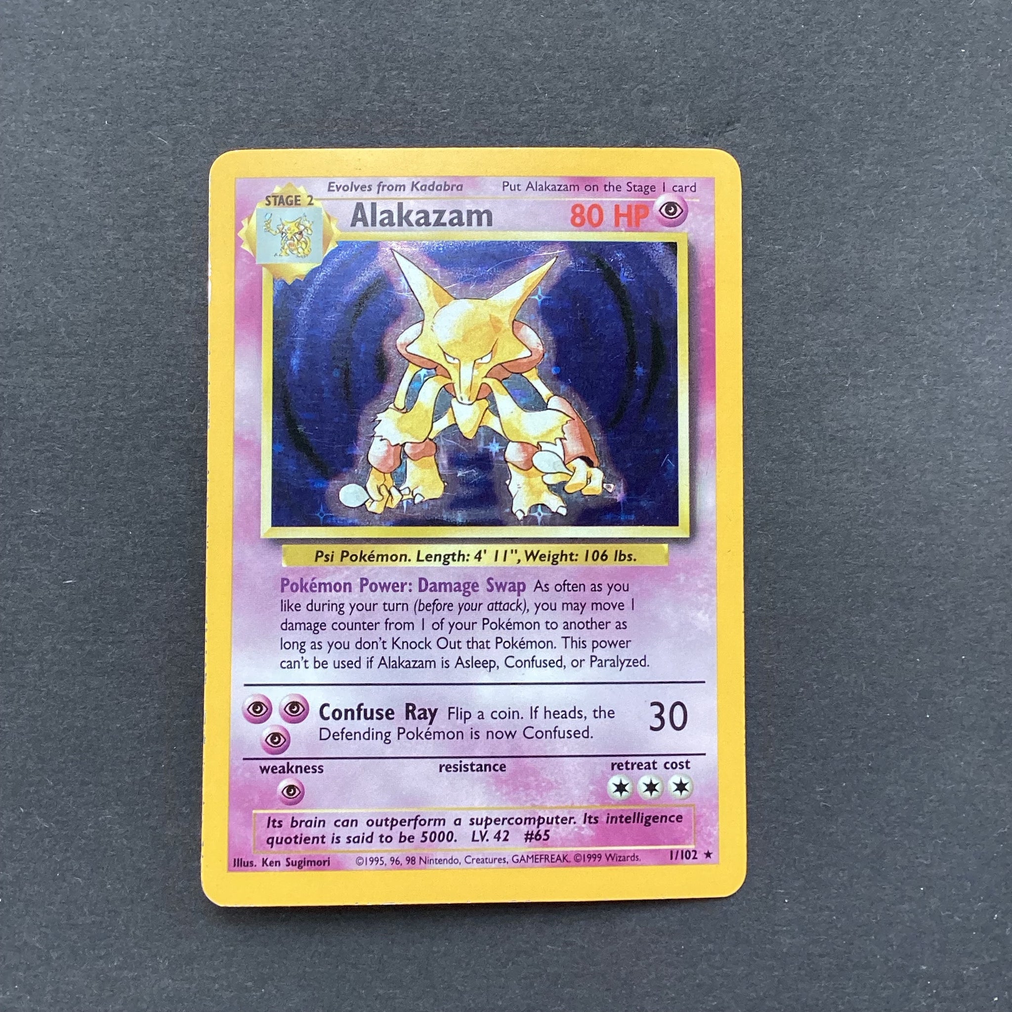 Pokemon Base Set - Alakazam - 1/102 - Used Rare Holo Card Card Empire Pokemon Base Set - Alakazam - 1/102 - Used Rare Holo Card Card Empire